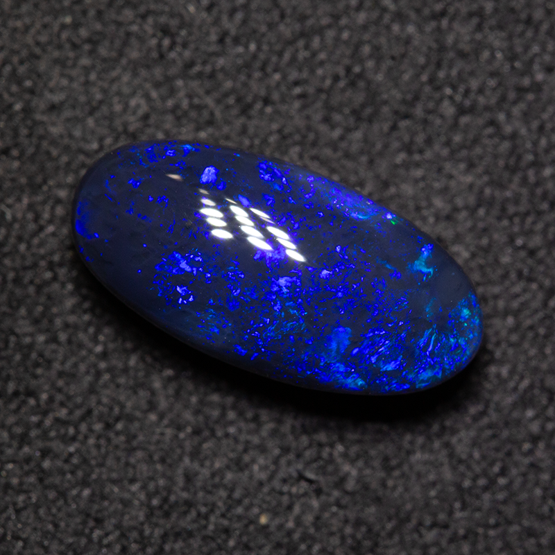 2.28 ct black opal 12.2x6x5mm