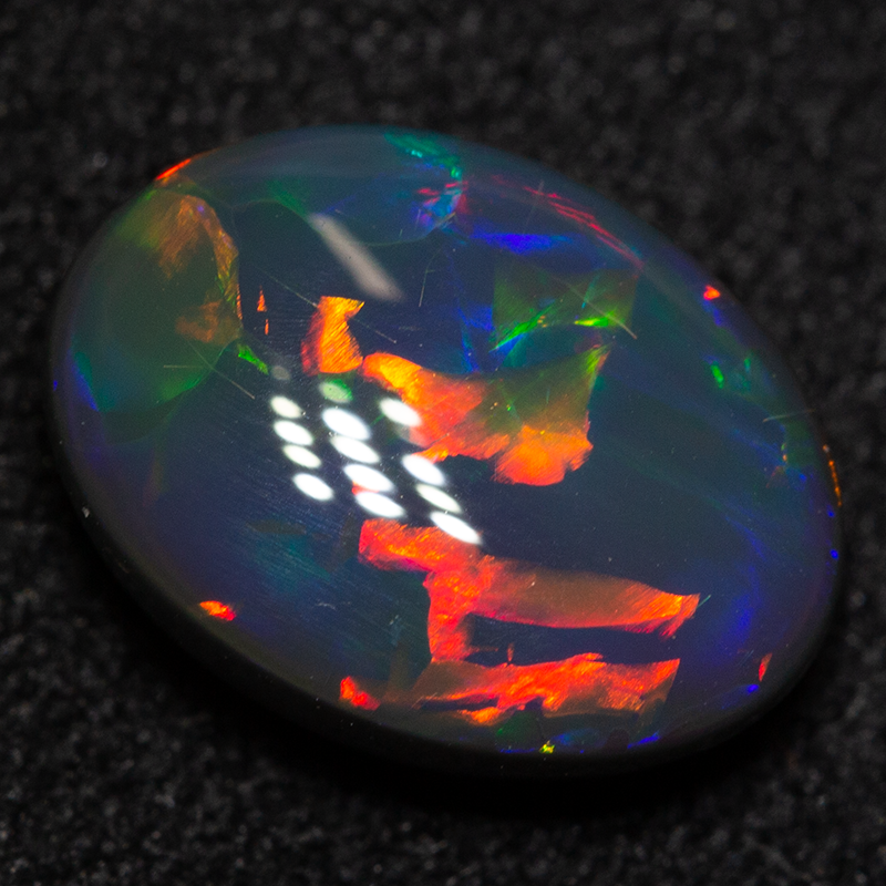 2.30 ct gem black opal 10.5x7.8x4.5mm