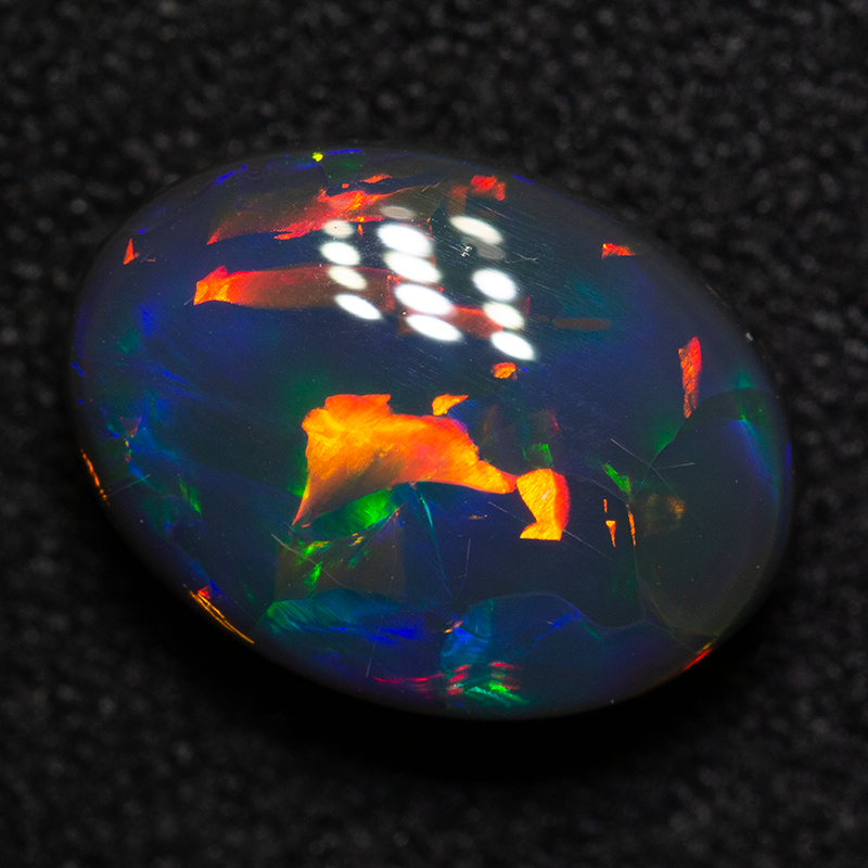2.30 ct gem black opal 10.5x7.8x4.5mm