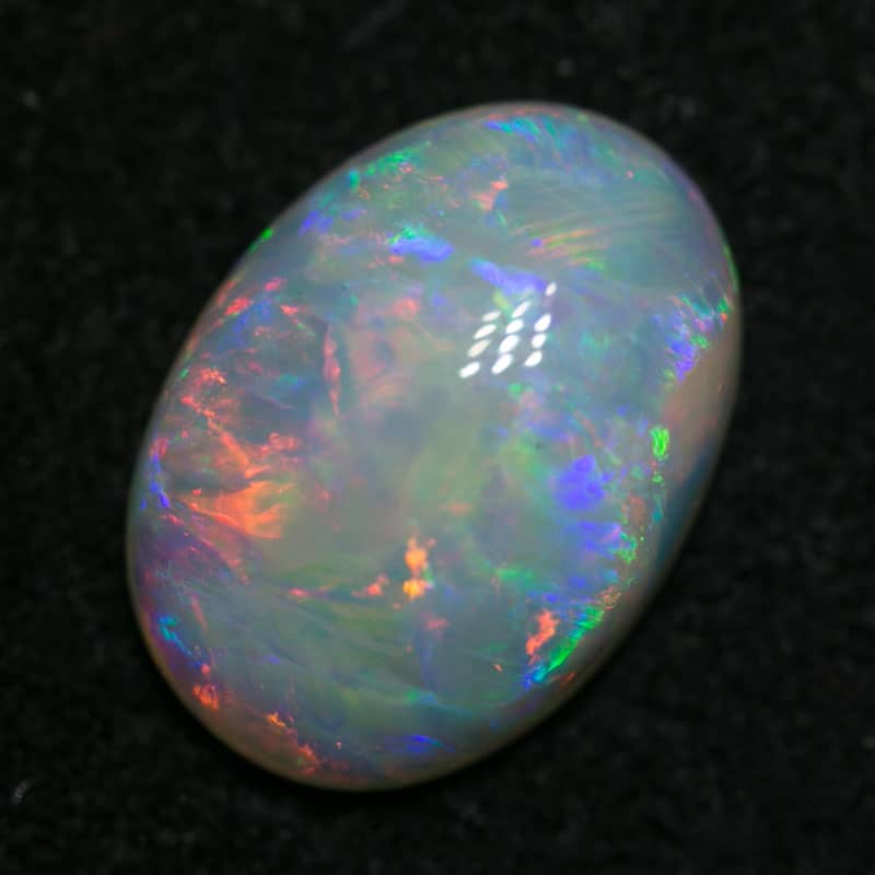 2.34 ct double sided white opal 11x8x4mm