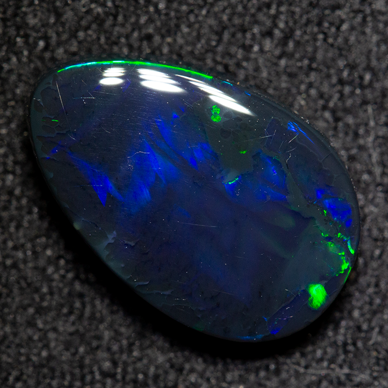 2.35 ct black opal 12x7.9x3.4mm