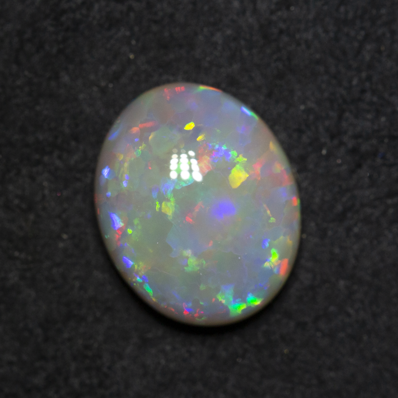 2.36 ct dark opal 10.7x8.7x3.9mm