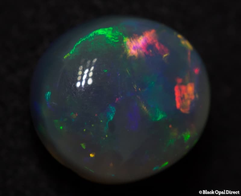 2.36ct semi black opal 9x8x5mm