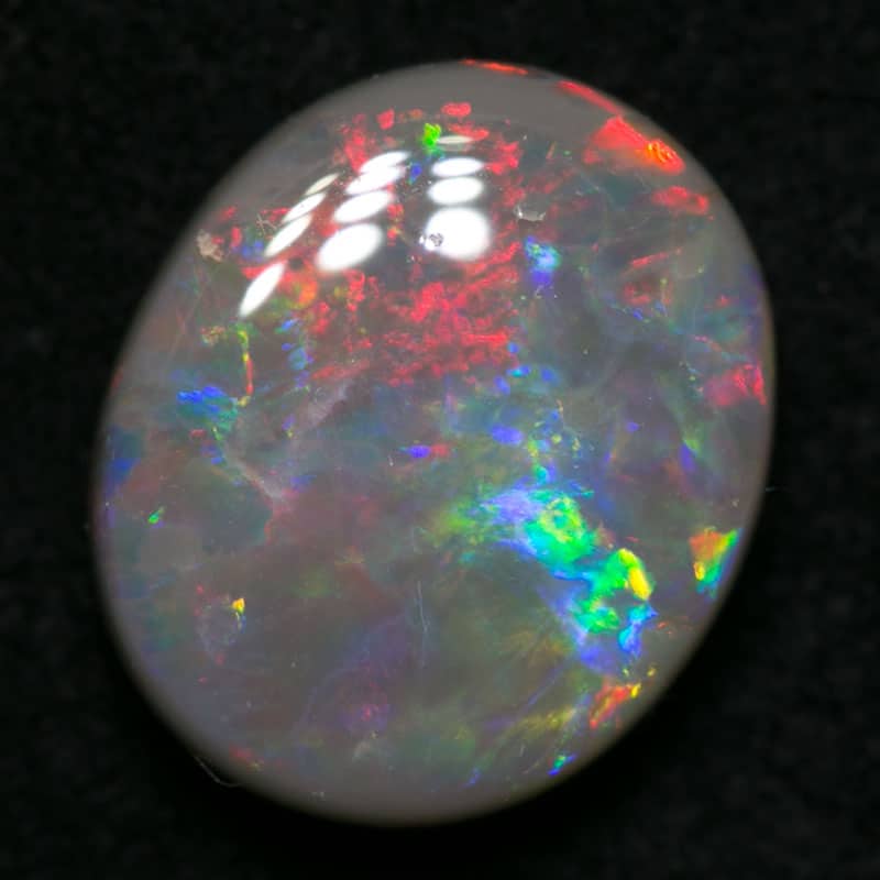 2.37 ct dark opal 10x9x4mm