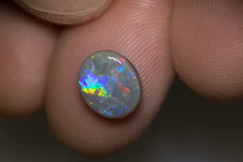 2.37 ct dark opal 10x9x4mm