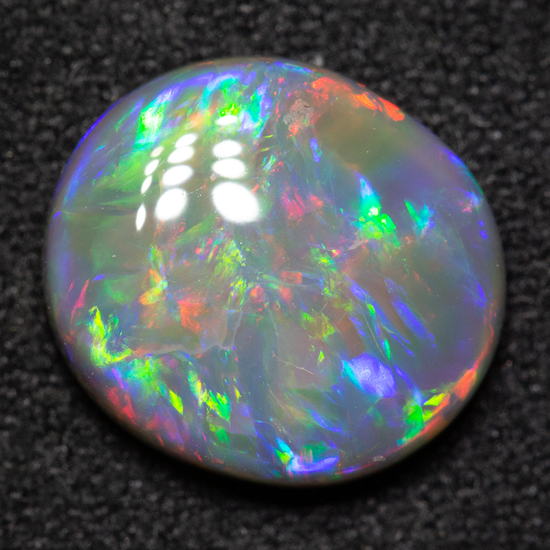 2.39 ct dark opal 10x9x3 mm