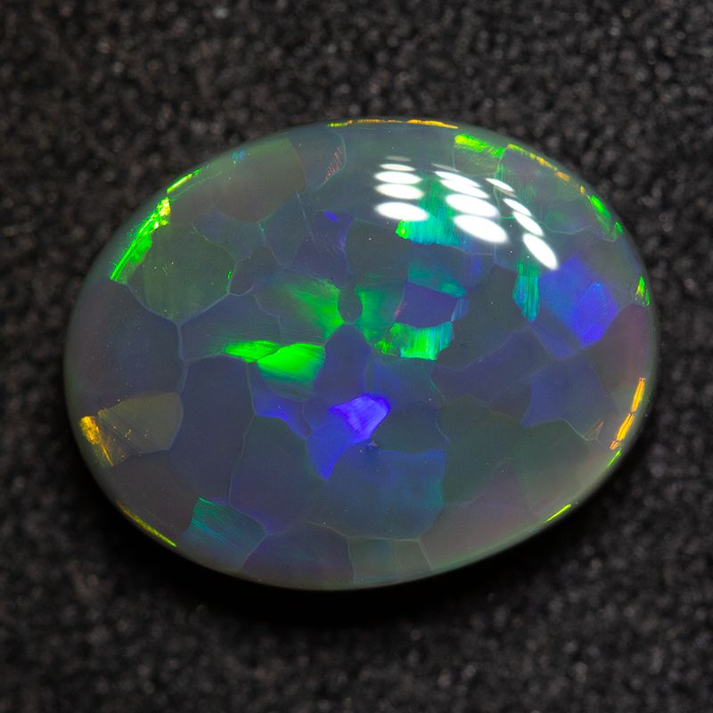 2.39 ct black opal 10.8x8.6x3.8mm