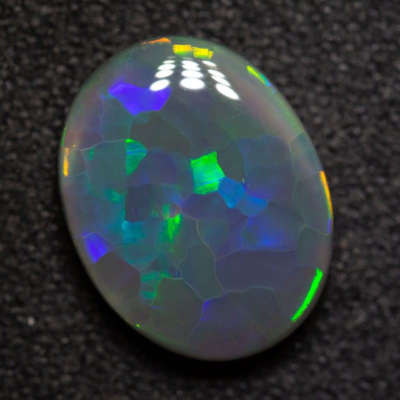 2.39 ct black opal 10.8x8.6x3.8mm