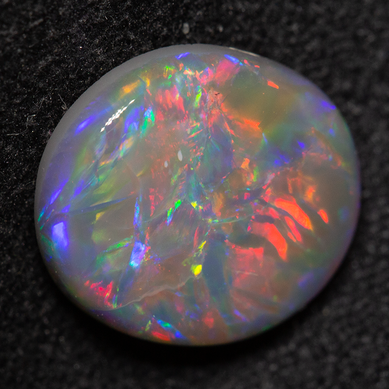 2.39 ct dark opal 10x9x3 mm