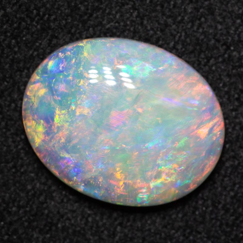 2.40 ct double-sided crystal opal 11.8x9.4x3.1mm