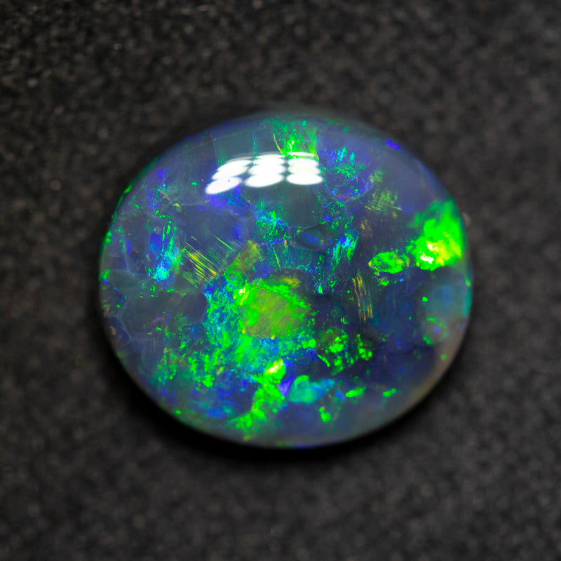 2.42 ct black opal 10x9x4.3mm