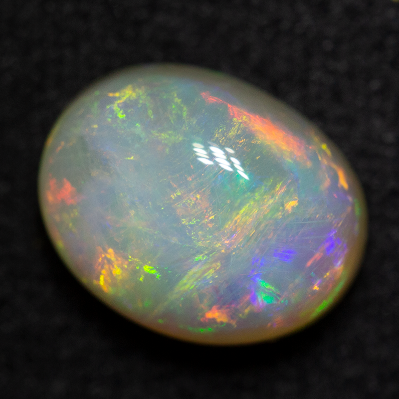 2.42 ct white opal 9.7x7.7x5.3mm