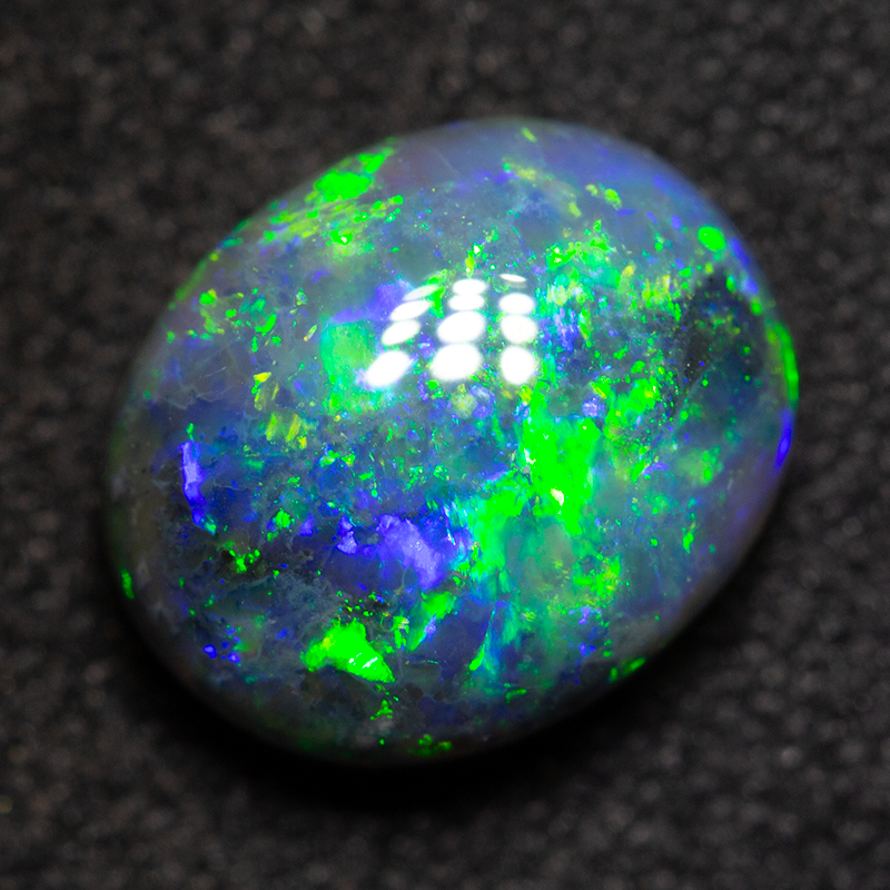 2.43 ct black opal 9.3x8x5mm