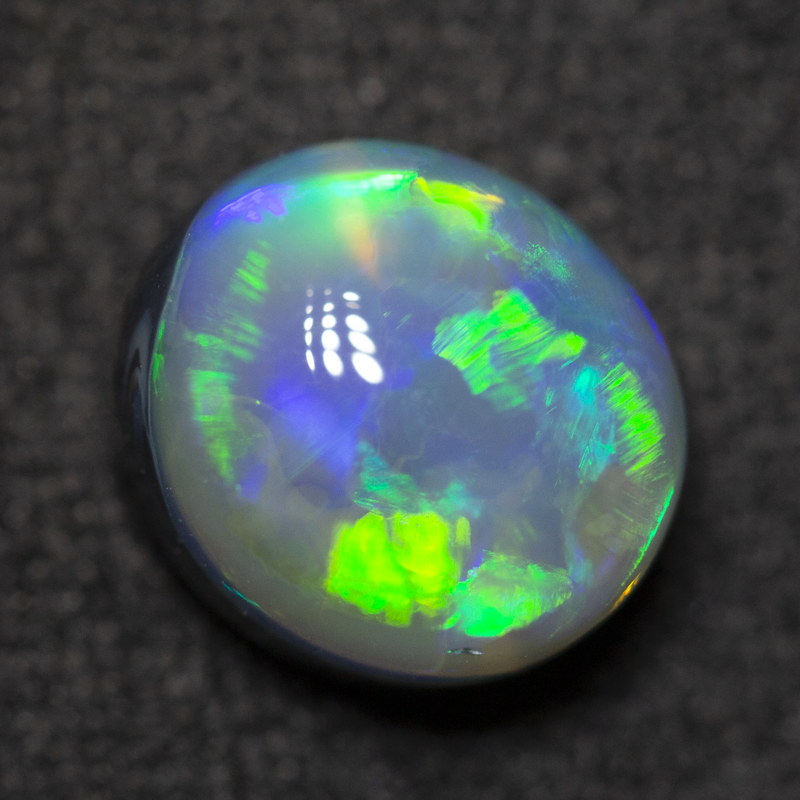 2.43 ct black opal 8.8x7.9x5.8mm