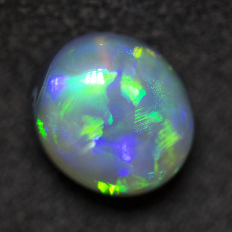 2.43 ct black opal 8.8x7.9x5.8mm