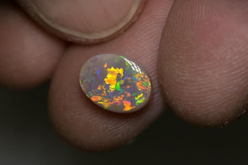 2.43 ct dark opal 10.5x8x4mm
