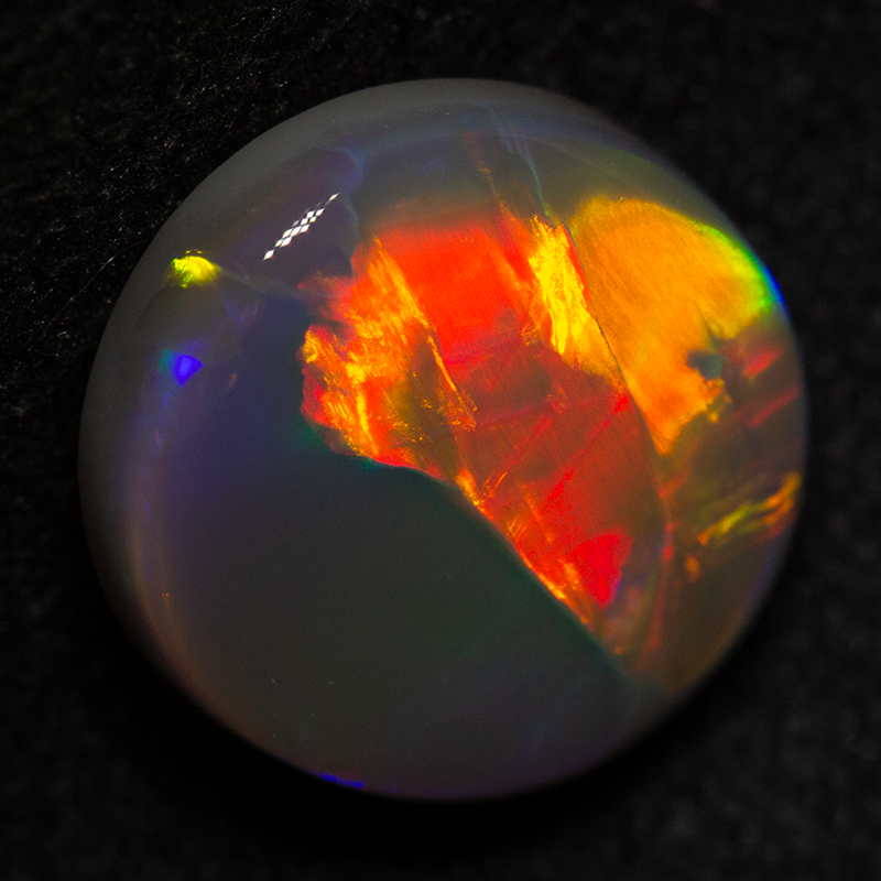 2.44 ct dark opal 9.8x9.3x4.1mm