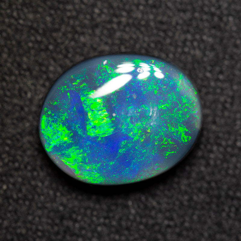 2.45 ct black opal 10.6x8.5x4.2mm