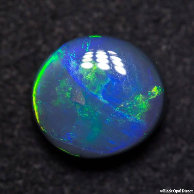 2.45 ct black opal 9x8x5mm