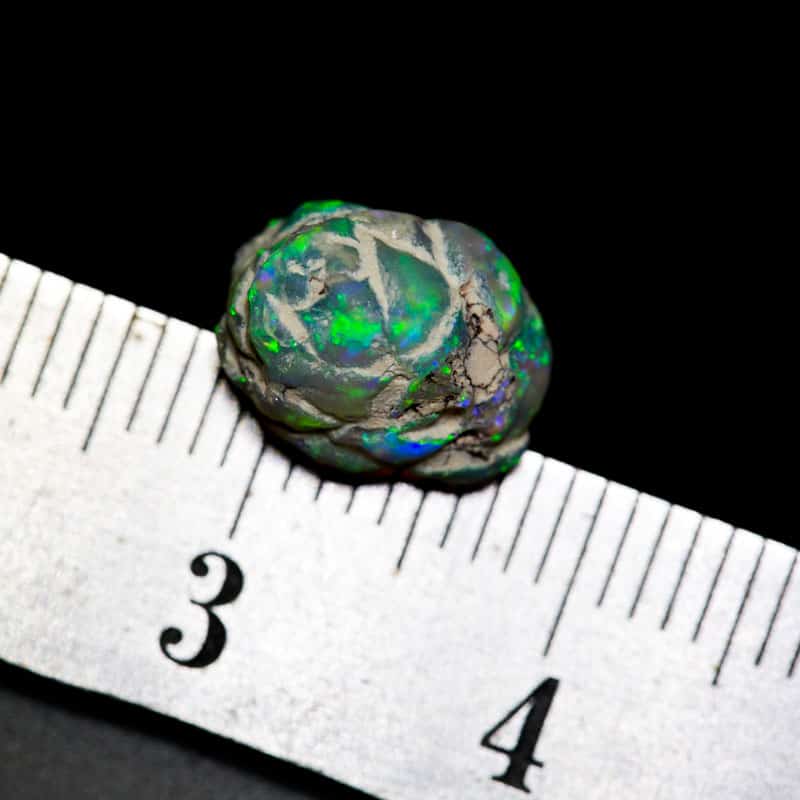 opalised pine cone 10mm across