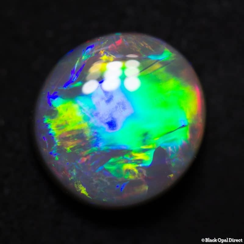 2.51 ct semi black opal 10x9x4mm