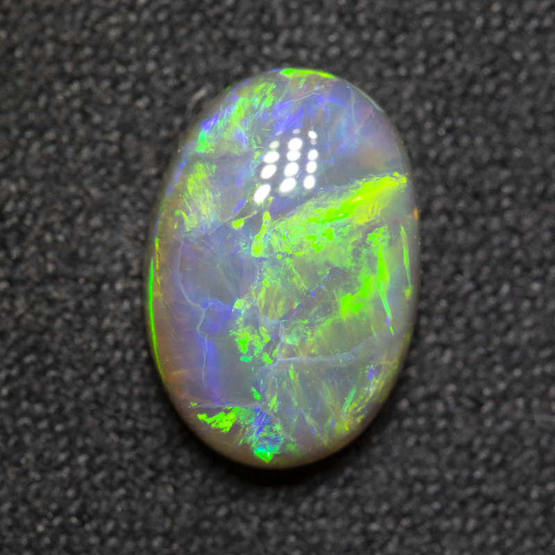 2.51 ct double-sided crystal opal 10.8x7.5x4.6mm