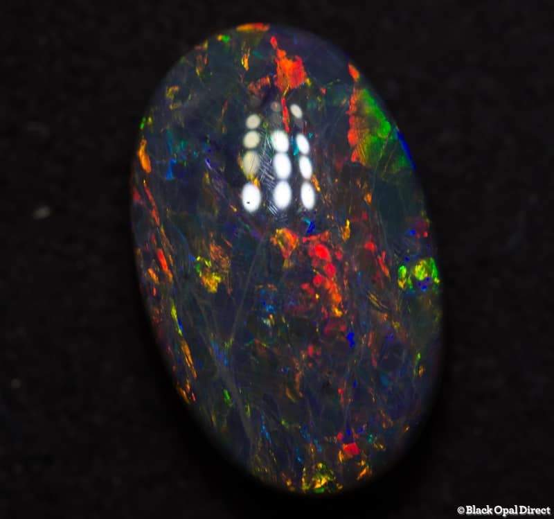 2.51 ct double sided black opal gem 11x7x5mm