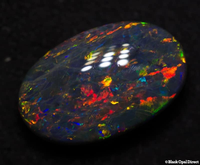 2.51 ct double sided black opal gem 11x7x5mm