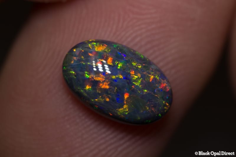 2.51 ct double sided black opal gem 11x7x5mm