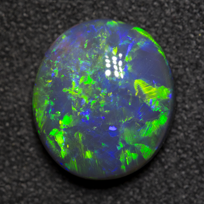2.52 ct black opal 10.6x9.4x4.1mm