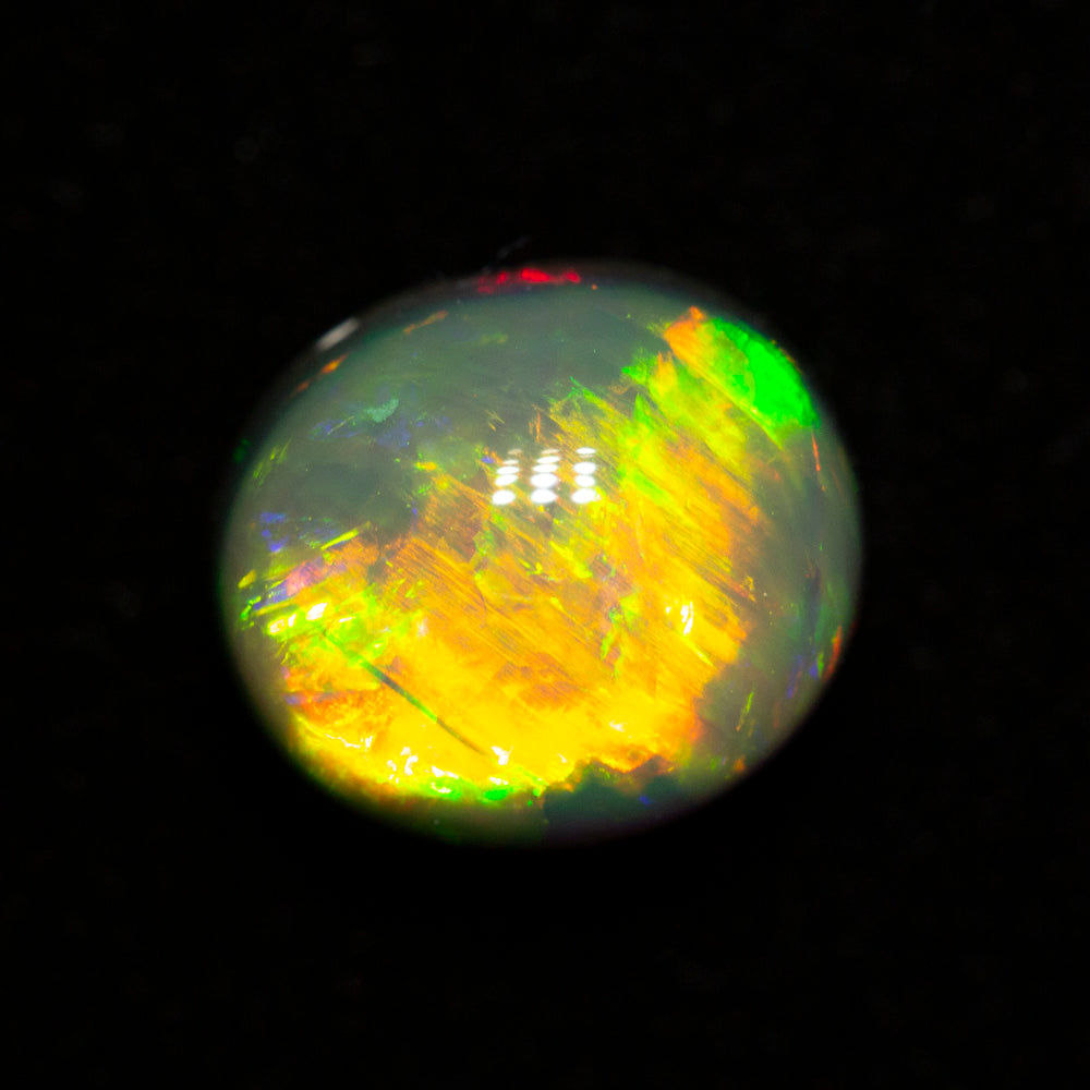 2.54 ct gem black opal 8.6x7.5x6.5mm