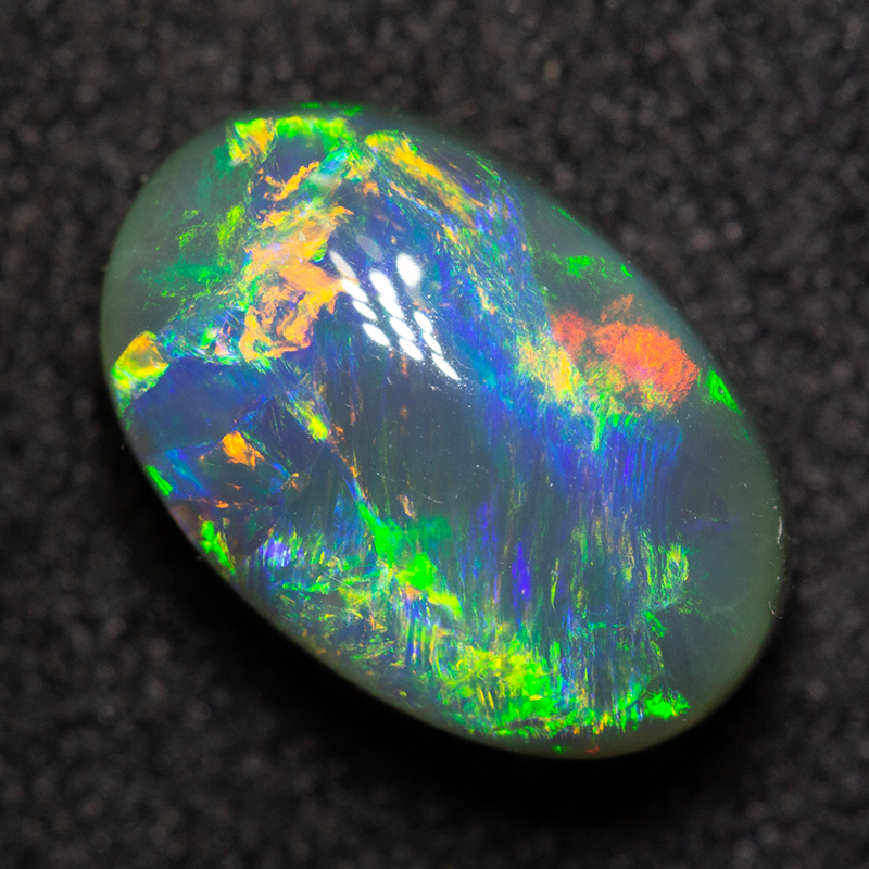 2.62 ct black opal 10.7x7.1x5.1mm