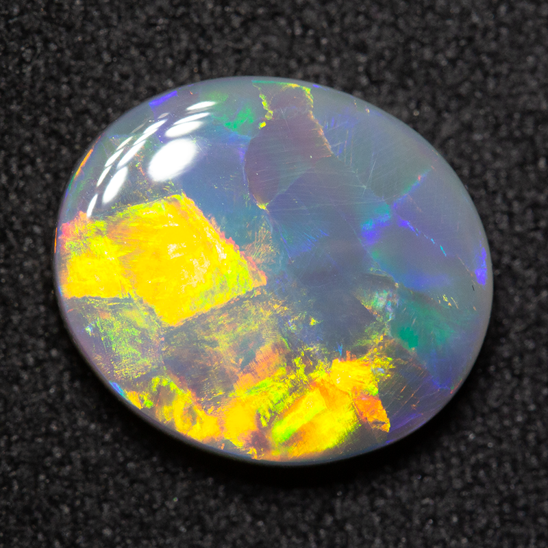 2.65 ct dark opal 11.5x10x3.4mm