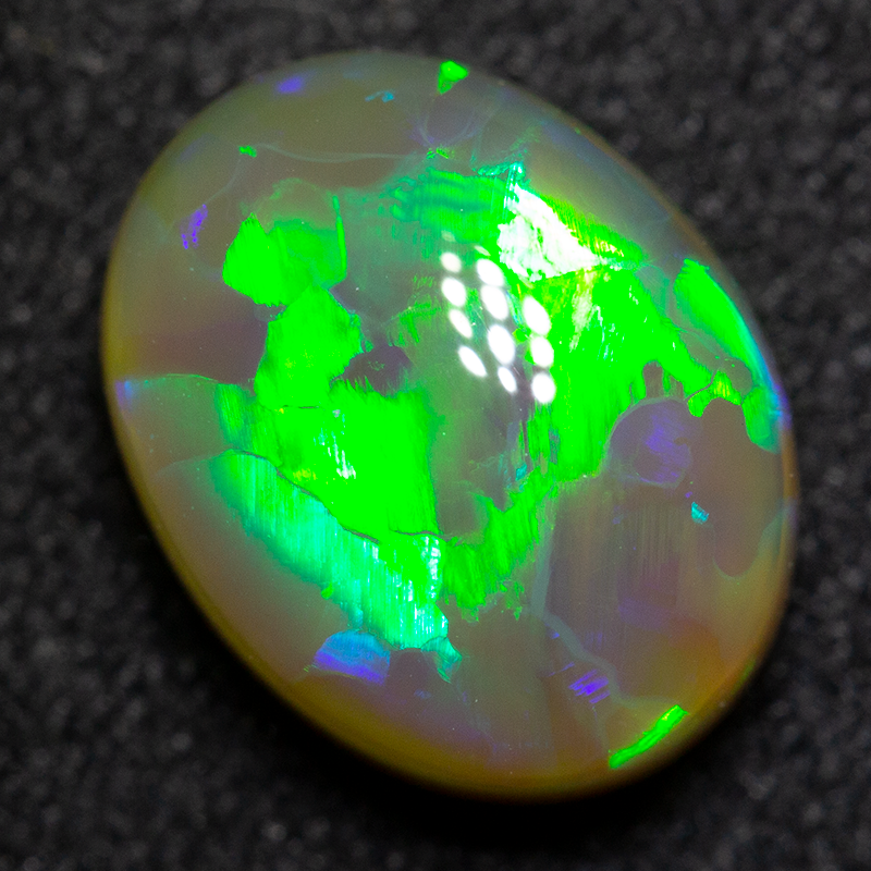 2.70 ct dark crystal opal 10x8x5 mm