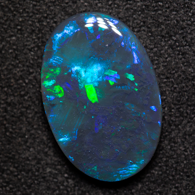 2.72 ct black opal 14.3x9.7x2.9mm