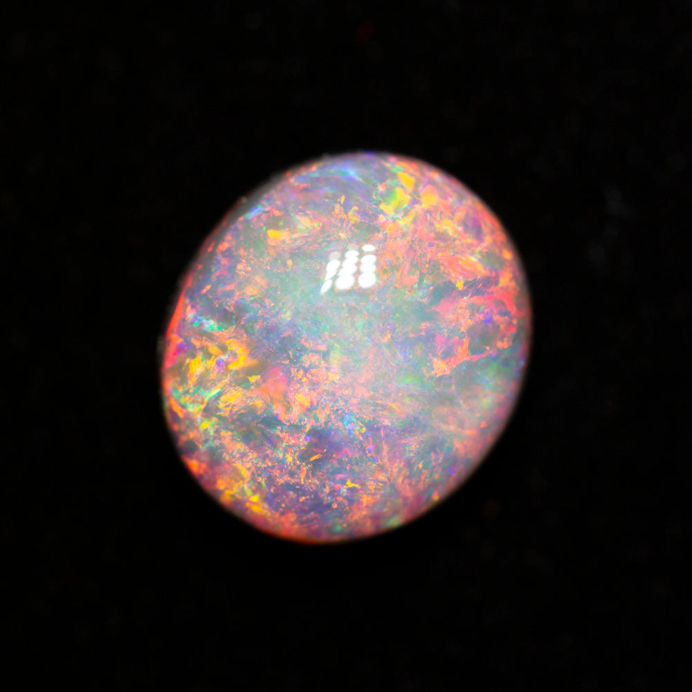 2.72 ct dark opal 9.7x8.6x5.4mm