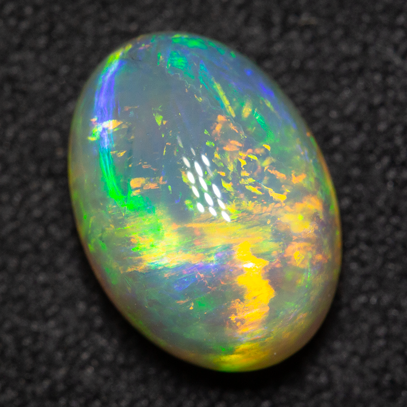 2.74 ct double-sided crystal opal 10.1x7.3x5.9mm