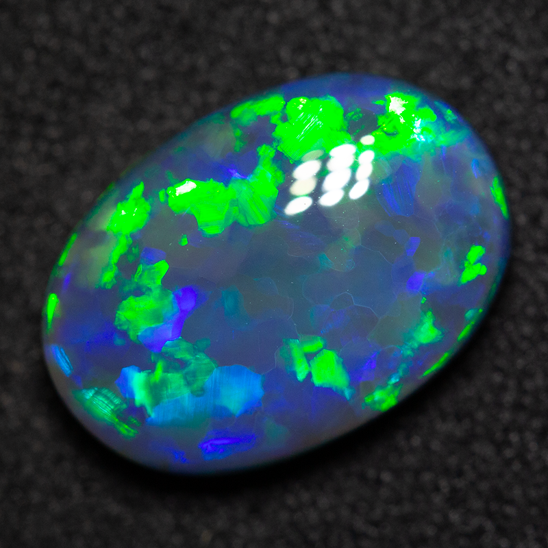 2.80 ct black opal 12.2x8.6x4mm