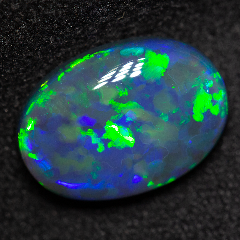 2.80 ct black opal 12.2x8.6x4mm