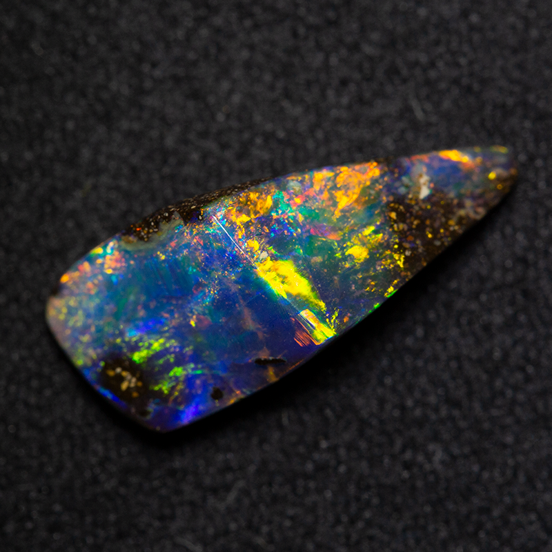 2.83 ct boulder opal 14.4x6.2x5.1mm