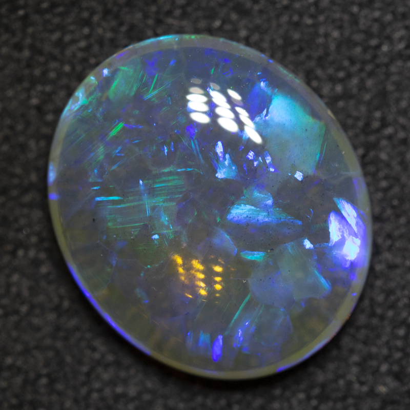 2.85 ct crystal opal 12.2x10.2x3.8mm