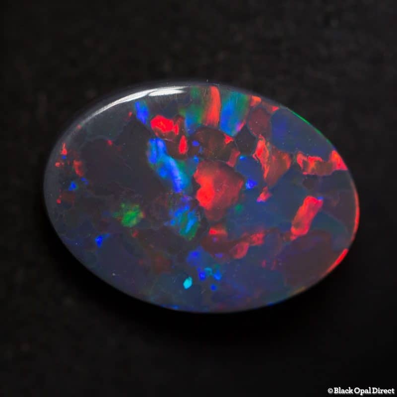 2.85 ct gem red blue on black opal 13x9x3mm For Al