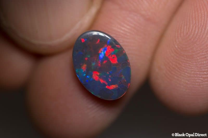 2.85 ct gem red blue on black opal 13x9x3mm For Al
