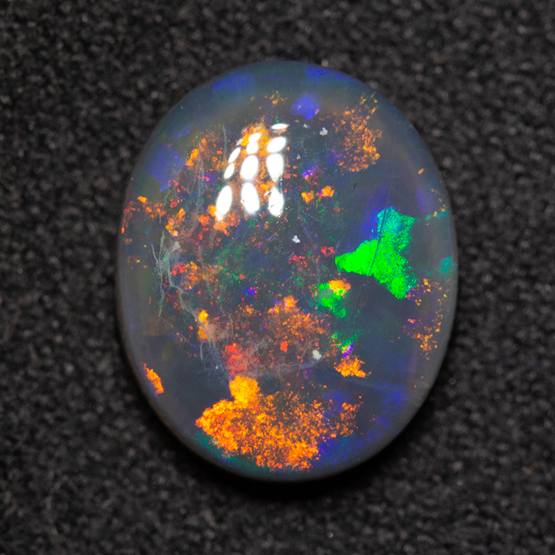 2.86 ct black opal 11x9x4mm