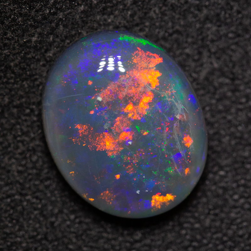 2.86 ct black opal 11x9x4mm