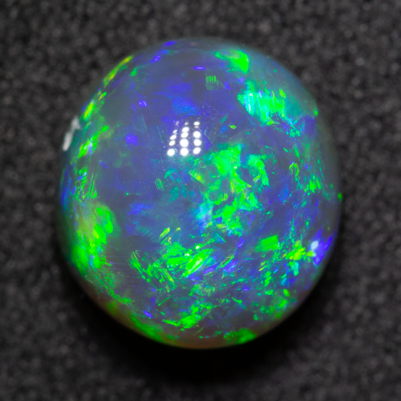 2.87 ct black opal 9x8.6x6.5mm