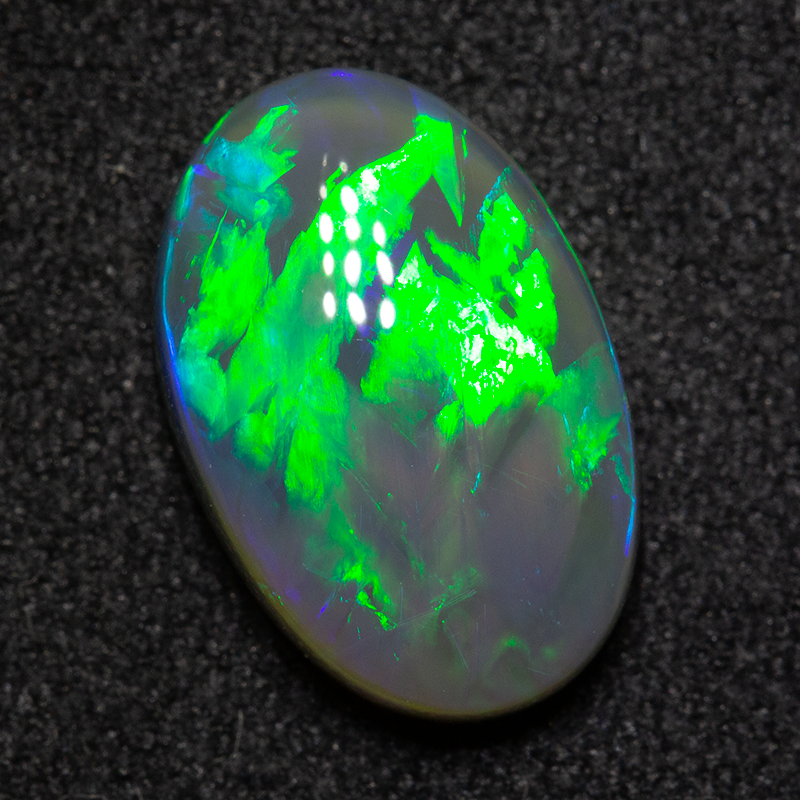 2.87 ct dark opal 12x8x4mm