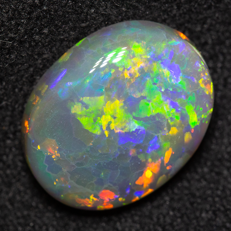 2.87 ct dark opal 11.6x9.2x4.2mm