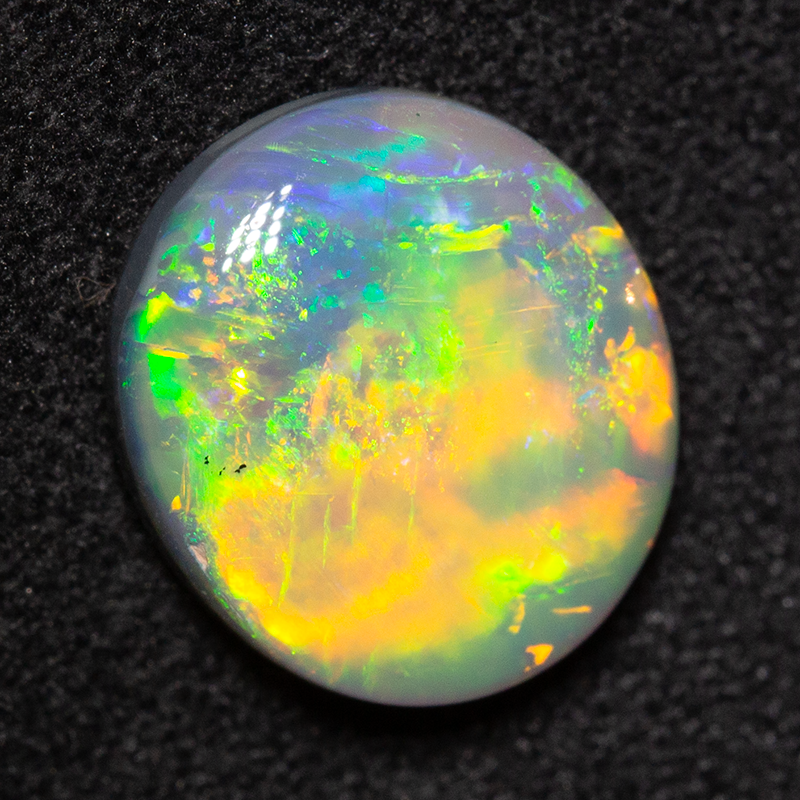 2.88 ct dark opal 11x10x3.5mm