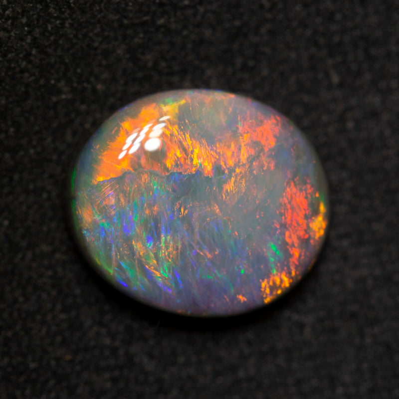 2.89 ct dark opal 10.8x9.2x4mm